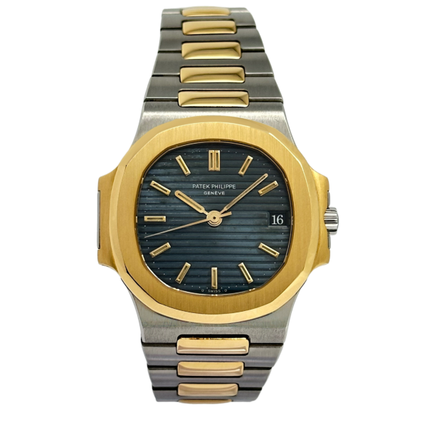 Patek philippe nautilus gold best sale black dial